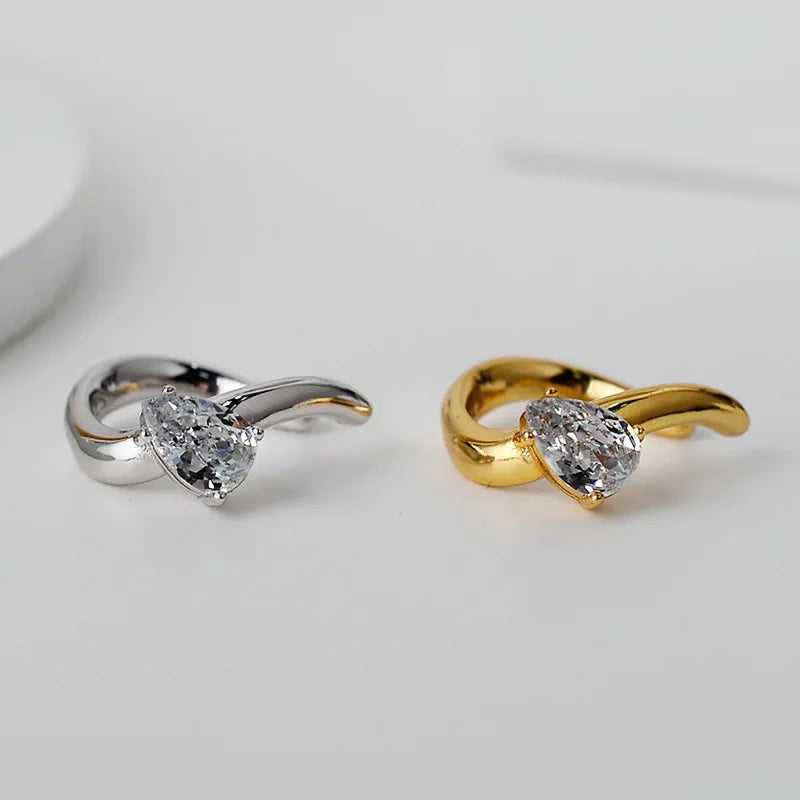 Solitaire CZ Wavy Earring E1037, 1 Piece