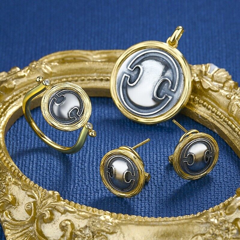 Rotating Shield Coin Ring