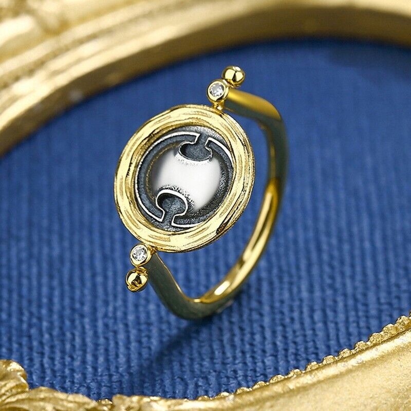 Rotating Shield Coin Ring